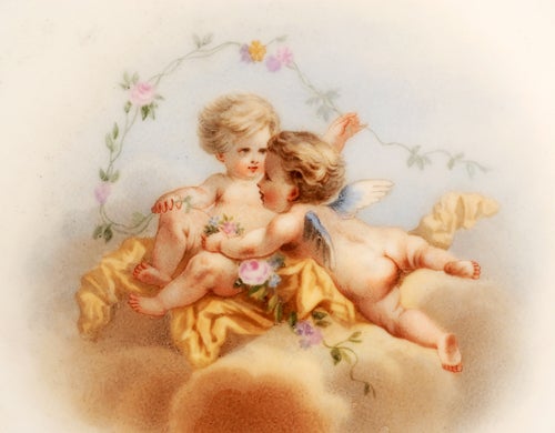 A Russian porcelain plate from the Alexandrinksy Turquoise Service, by the Imperial Porcelain Manufactory, ST Petersburg, underglaze mark of Nicholas II, 1902. The center painted with an image of two cherubs at play in the clouds surrounded by three