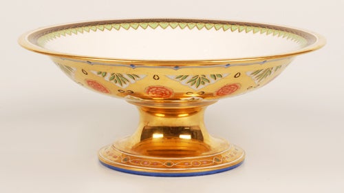 A pair of Russian porcelain compotes from the Kremlin Service by the Imperial Porcelain Factory, Alexander II period (1855-1881). Of circular form, the outer bowl, rim, stem and spreading foot gilded, the foot painted with a band simulating gems,