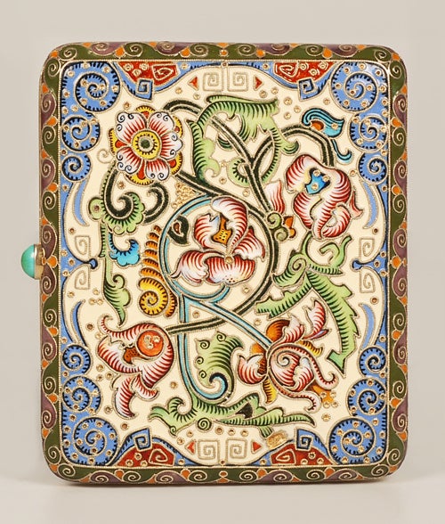 A Russian gilded silver and shaded cloisonné enamel cigarette case, attributed to Feodor Ruckert, Moscow, circa 1896-1908, both sides decorated with scrolling florals on a cream and olive green ground. Inscription on the interior dated 1914.