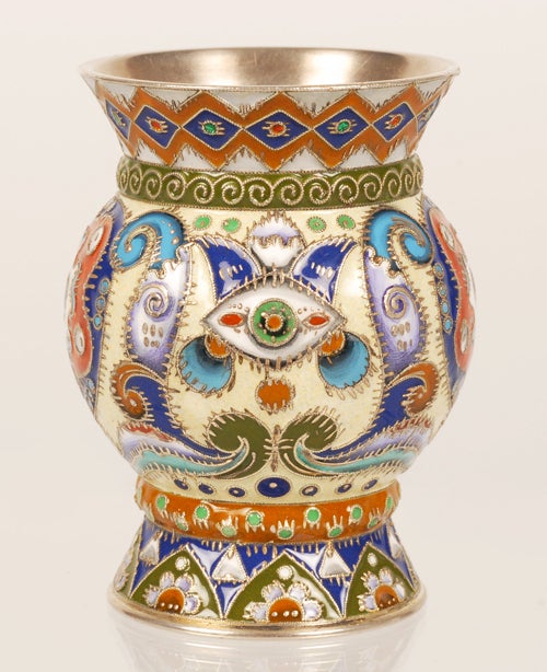 A Russian Art Nouveau gilded silver and shaded enamel beaker, Feodor Rückert, retailed by Gashkel and Shik, Moscow, circa 1908-1917. Of baluster shape, the body colorfully enameled with floral, biomorphic and abstract forms against a pale yellow