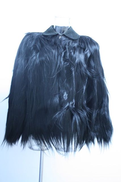 This is a very unique, rare, monkey fur capecoat from the 1920's. Monkey fur was all the rage around 1900-1930's and a bit 1940's.Populaized by such screen stars as Marlene Dietrich. The fur is from the Colobus monkey. The coat has a embroidered
