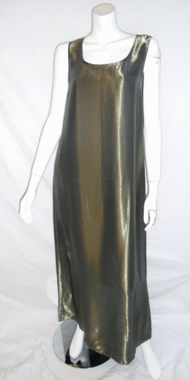 Master of minimalism designer Zoran made this fantastic paper thin long silk coat over metallic golden  sleeveless dress. Just add massive long necklace and look incredibly stylish. New.One size fits all. 
Free shipping