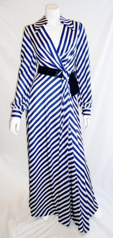 Beautiful Eva Gabor look by Estevez nautical belted maxi dress. Poly jersey navy and white stripes.Long sleeves. Wrap style, with navy blue patent leather belt. Mint condition. Like new, 
Zipper back closure. Fully lined. 
Bust 38