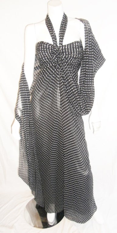 Beautiful and very feminine Oscar De la Renta Leopard  silk Chiffon Gown. Black and white polka dot. Long shawl attached to the gown as a part of design.. Front corset style closure. 
Pristine condition. Like new.
Size 12
 Bust 40