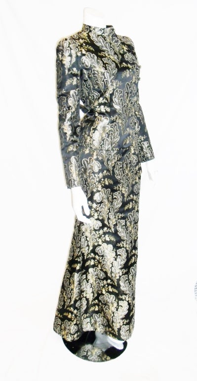 Known for his  structural design Pierre Balmain  created this incredibly beautiful  Asia inspired silk brocade ensemble .Side buttoned  jacket and mermaid cut skirt. All hand done and in absolute  pristine  condition like new!! never worn. Every
