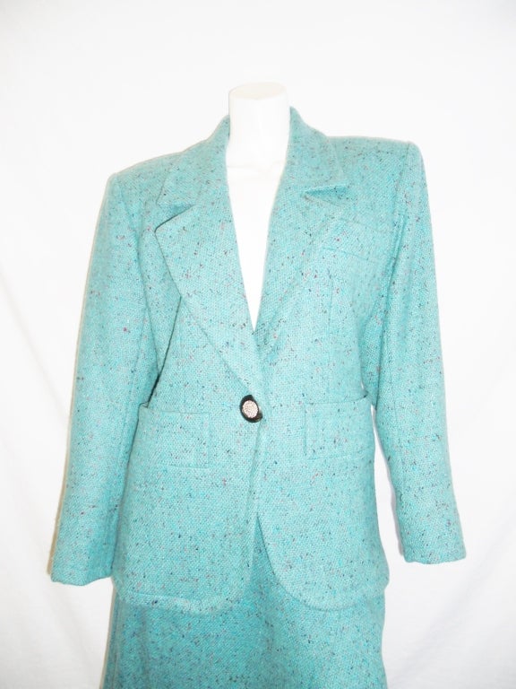 Pristine Condition and perfect for spring YVES SAINT LAURENT Rive Gauche  Vintage turquoise  Tweed skirt suit.  Either piece could be worn separately and still make a statement. Wrap skirt and single breasted jacket with inlayed pockets and notched