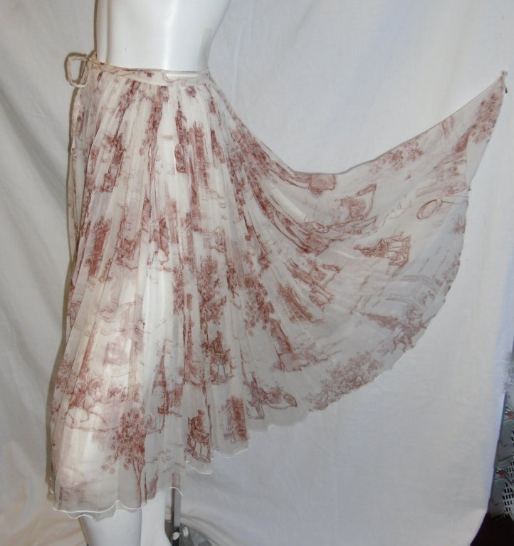 new beautiful and very feminine silk chiffon  wrap style Hermes skirt. Size 38. Length 26