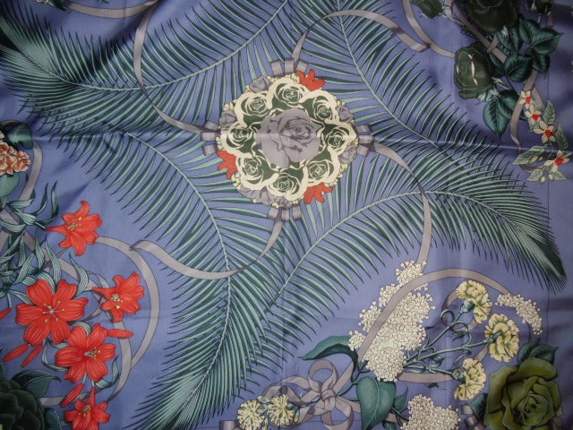 AUTHENTIC HERMES Fleurs de l'Opera silk scarf .Original silk screen design by Julia Abadie c1989 features a gorgeous array of ferns and flowers over a  blue background.Coral red border. 100% silk, hand rolled hem, made in France. No stains, smells,