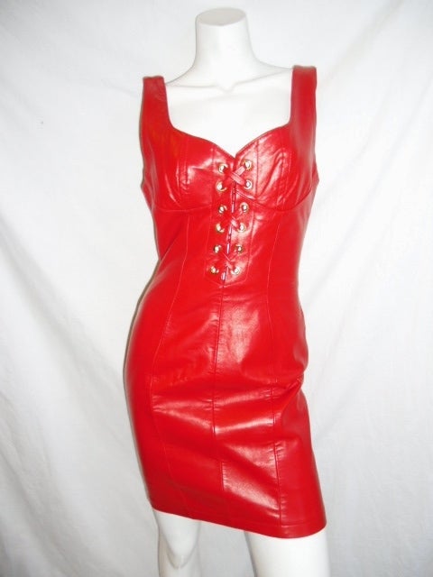 Buttery soft Spectacular North Beach Leather lace up Red Mini Dress  and Bolero Jacket. Never worn in New condition..Jacket has one front button closure.Same lace up detail at the back on the waist line. Both pieces are fabulously fitted.
Size