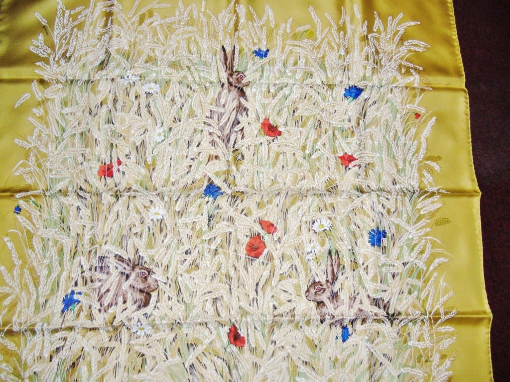 stunning vintage Hermès silk scarf depicting rabbits in a wheat field (les bles). a design of Hugo Grygkar, who designed for Hermès for 70 years. he designed Hermès first three designs in 1937. a highly collectible, rare find! Never used in original