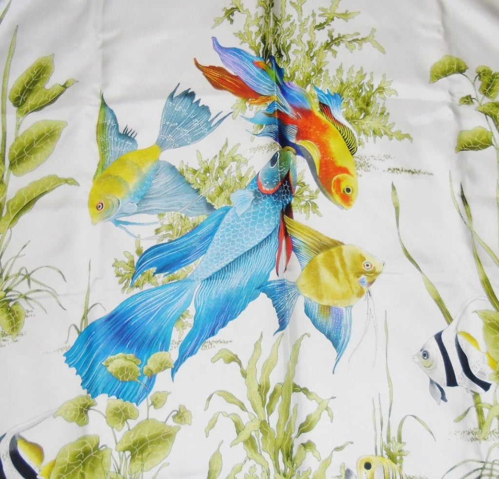 Gorgeous silk twill scarf by Gucci. Ivory base,Yellow  trim Incredibly detailed with underwater life and exotic fish . 35