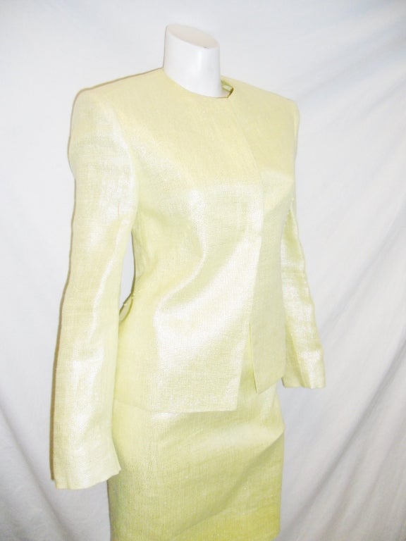 Absolutely stunning yellow and silver woven linen Versace Couture summer skirt suit. New with all tags attached. Intricate loop handmade details along seams on the jacket. Pencil skirt. Concealed front button closure.Size italian 38 very small us sz