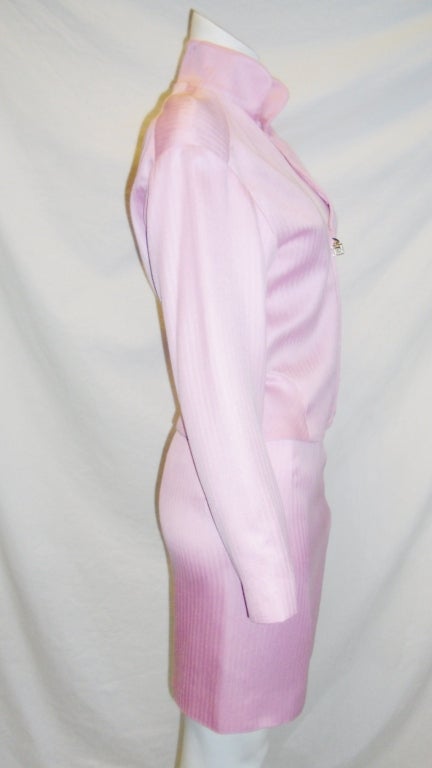 Original Gianni Versace piece. New with all tags attacked. Lite pink color  fitted jacket and mini skirt. 100% silk , silk lined. Zipper front closure.  size 38
jacket bust  36