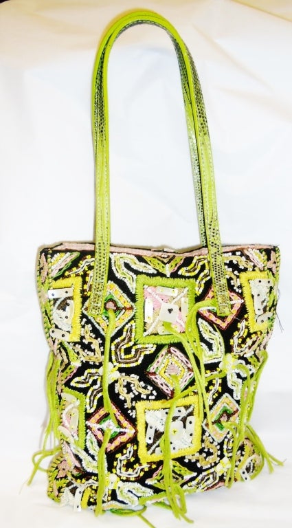 Fendi Fabulous BOHO  Hand embroidered and beaded bag . Multi colored caviar beads and mother of pearl flakes on cotton canvas. . Snake skin handles. Pink silk lining with one zipper closure compartment. Slight make up soiling inside. Outside is in