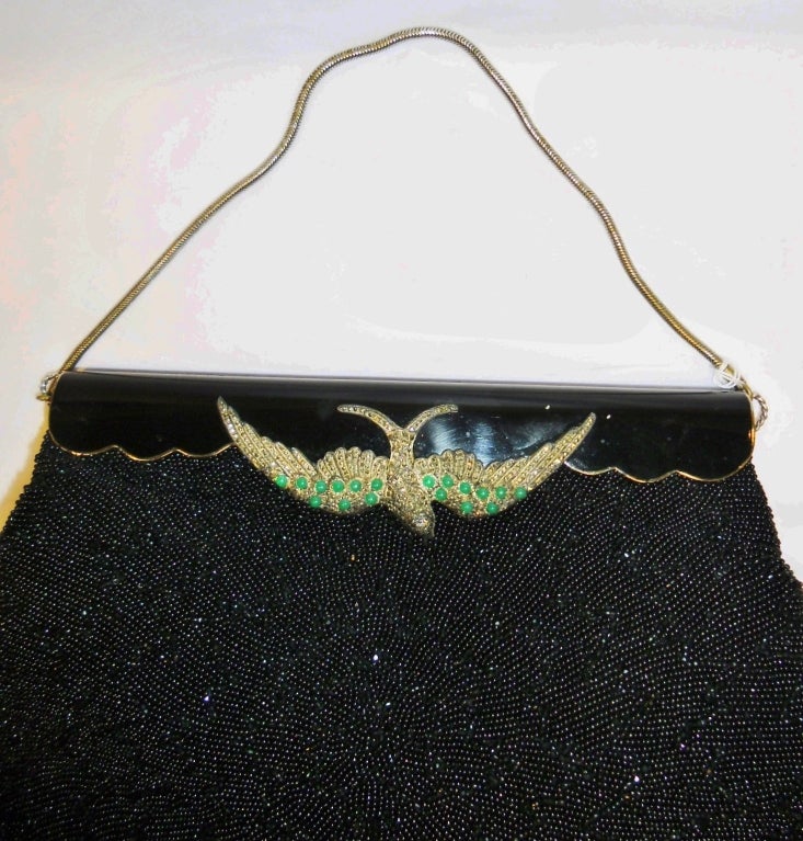 Gorgeous Vintage Black Caviar Beads evening  Bag . Frame feature  black enamel with silver filigree  and emerald Bird . Emerald green lining. Mint condition. Size 11