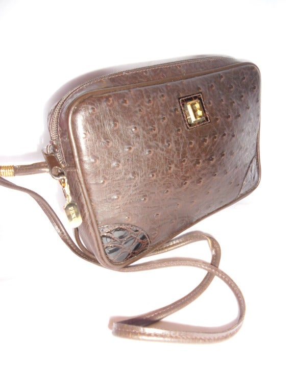 Fabulous Fendi vintage ostrich cross body  bag. Top zipper closure, Fendi front sign, tan lining. Made in Italy. Circa mid 1990. 
Measures Approx 8.5