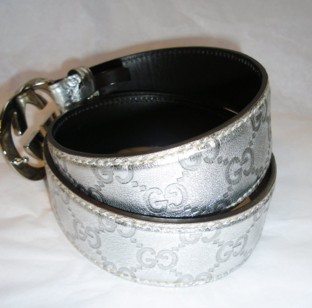 Never worn  Beautiful Gucci Metallic Silver Guccissima Leather  Belt GG Buckle Belt is 1.5 ' wide and 37