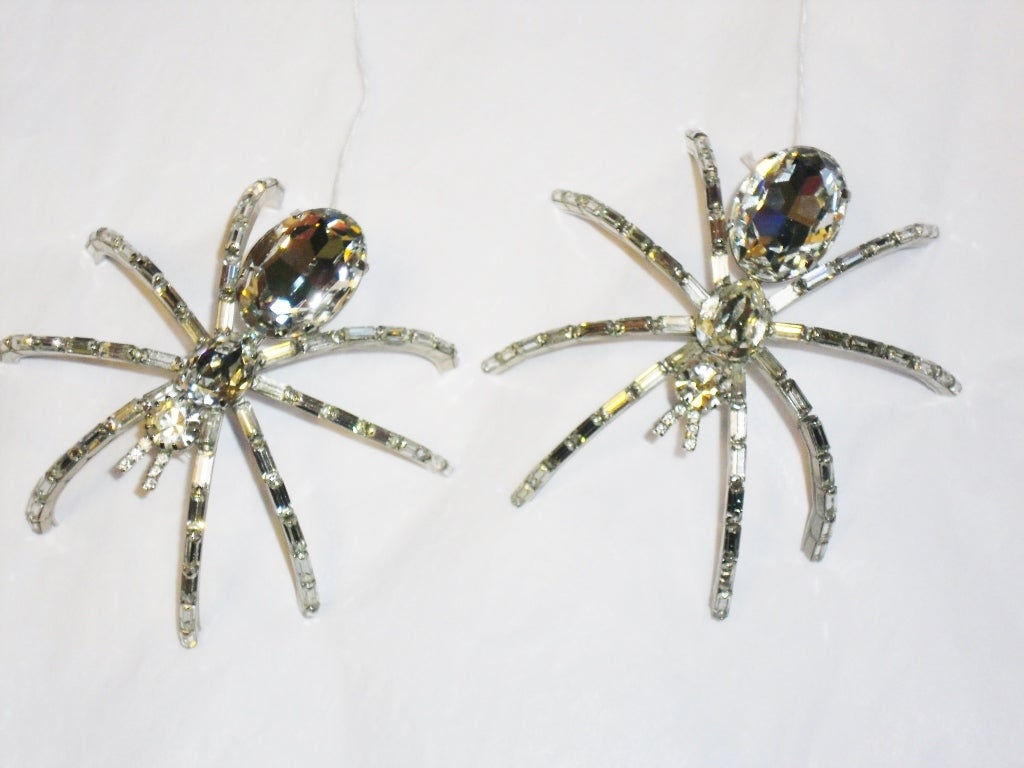 amazing and a must have Butler and Wilson set of two  Large Crystal Spider Brooches . perfect and without any flaws. Each one is 5 inches  with large crystal approx 1.5 inch long.  Diamond cut with spectacular effects on light.