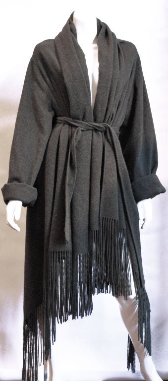 Rare Hermes Cashmere Fringed Coat Wrap Jacket<br />
Talking about luxury? Wrap yourself in this absolutely spectacular 100% finest cashmere coat by Hermes One size charcoal grey .8.5