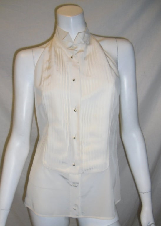 Fabulous and sexy halter backless YVES SAINT LAURENT Rive Gauche  cream  tuxedo blouse. pleated front with gold studs closure. Size 42 Waist 34