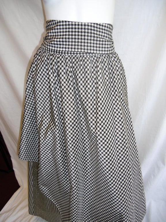 Silk Black and white checker with gold thread Haute Couture Chez Ninon spectacular long garden skirt with waist bone reinforces sash.Perfect with white crisp cotton shirt or blouse. 
Underskirt silk  bottom reinforced with horsehair .
Dated