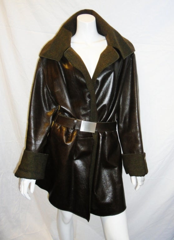 Baby soft Lamb leather in distressed  finish lined with 100% cashmere. Belted. Amazing coat. lite in weight since both fabric and leather are incredibly picked yet warm. Pristine condition. Collection fall 99.size 42 but it will tolerate lagers size