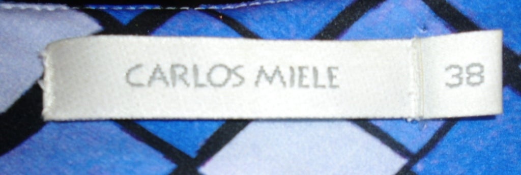 The blue mosaic-patterned gown from Carlos Miele 2