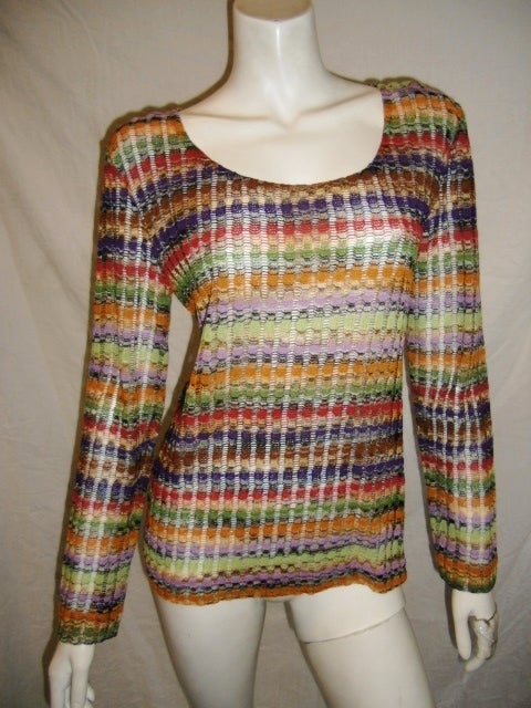 Missoni rainbow column  crochet knitted long sleeve top , like new never worn , made in Italy ,Circa 1980 with label made exclusively for Saks Fifth Ave Bust:36'', Waist:34'', sleeves:23'', Length: 22.5'', great with a coat or a jacket, perfect for