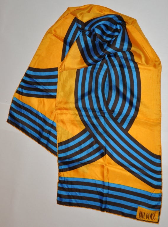 Bill Blass silk scarf is in bold yellow with black and blue stripes. The scarf measures 15
