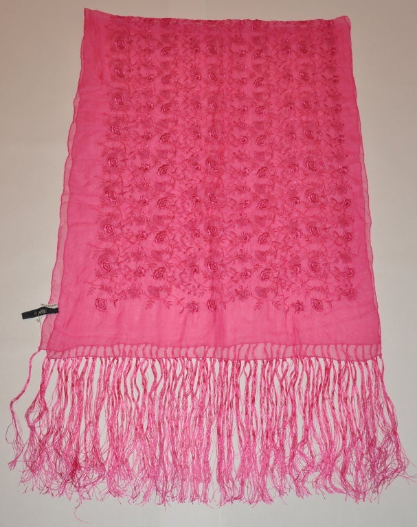 Emanuel Ungarobold fuchsia silk chiffon scarf has detailed embroidery throughout. Silk fringe measures 9 1/2