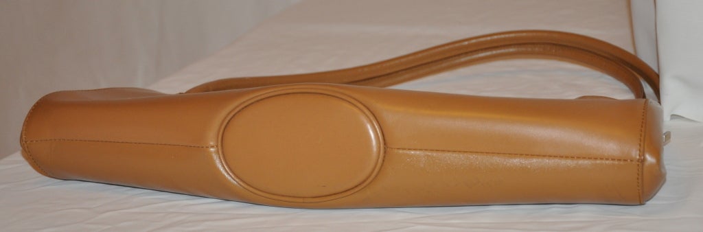 Helmut Lang camel color calfskin handbag has double handles measuring 8 1/4