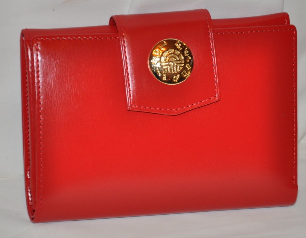 Louis Feraud red calfskin leather wallet measures 4