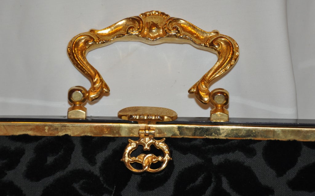 Black Heavy gold hardware handbag