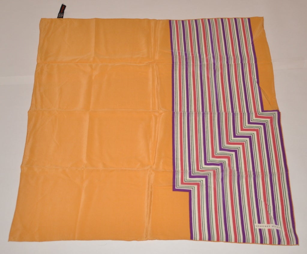 Geoffrey Beene beige with abstract multi-color stripes silk scarf measures 31