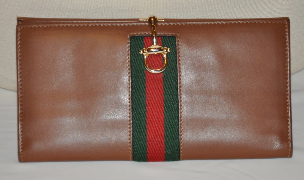 Gucci famous classic calfskin leather accented with their signature 
