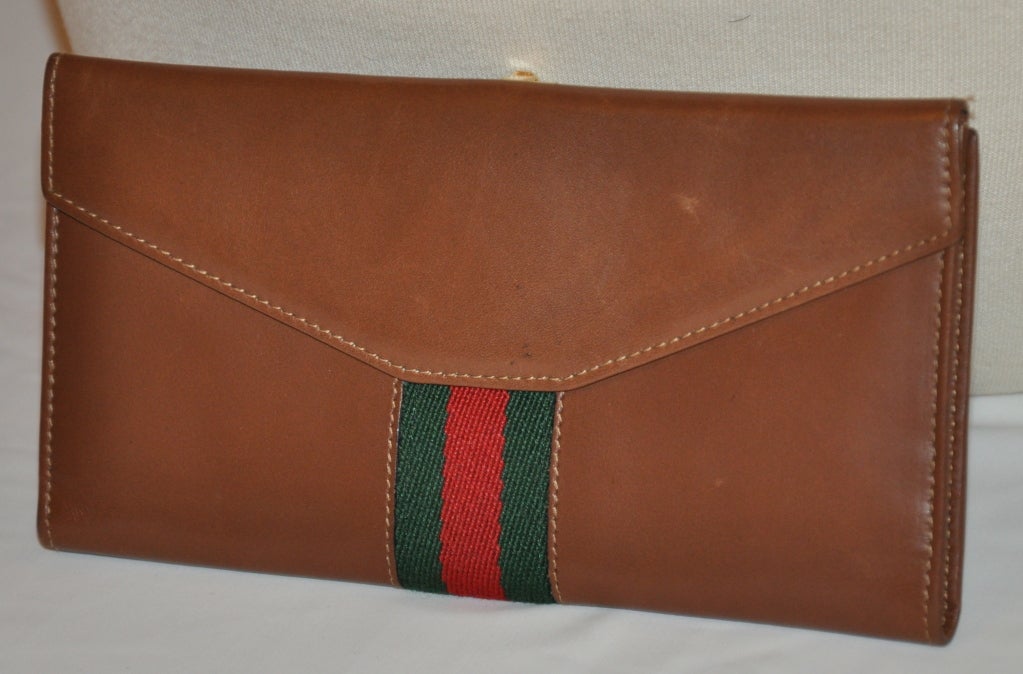 Brown Gucci calfskin with horseshoe bit hardware and GG strip wallet