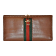 Gucci calfskin with horseshoe bit hardware and GG strip wallet