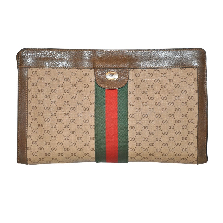 Gucci "GG" Canvas with signature stripe clutch