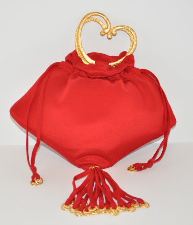 Este maravilloso bolso de noche Bacich's Valentine rojo 