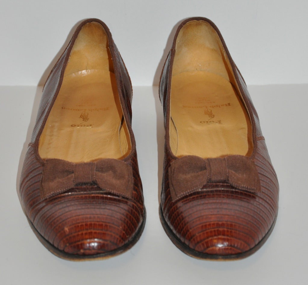 Ralph Lauren men's lizard evening shoes is accented with a silk 