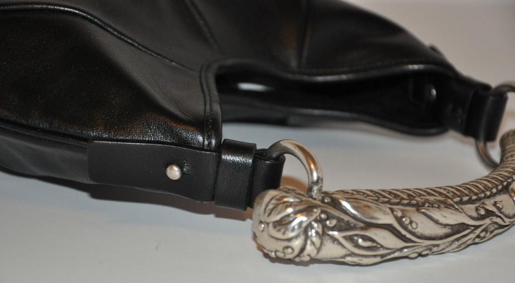 black leather handbag with silver hardware