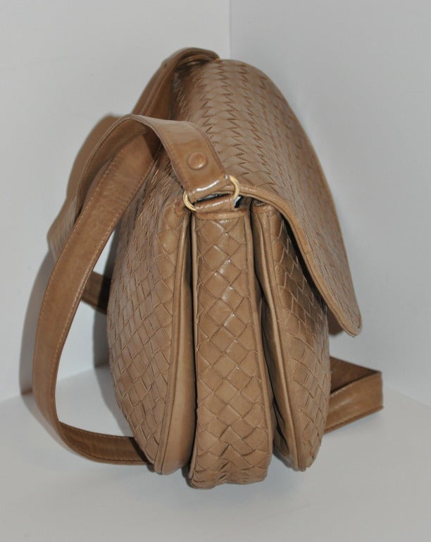 Bottega Veneta Taupe classic woven lambskin leather shoulder bag has three separate compartments with one having a zippered compartment within. Strap can be adjusted if desire. Straps measures 20