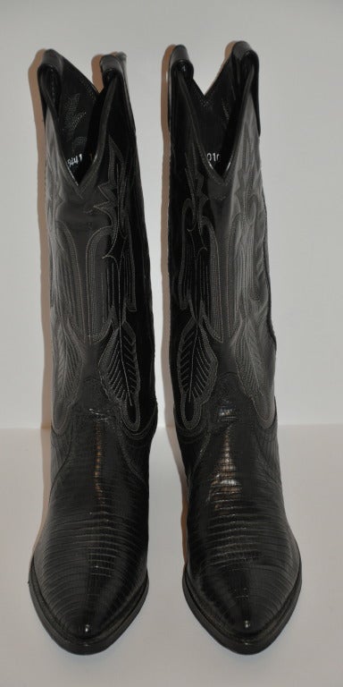 Dan Post's Made-In-USA Black leather cowboy boots are hand-crafted with detailed top-stitching throughout. Size is American 8 medium. Height of the boot measures 12 1/2