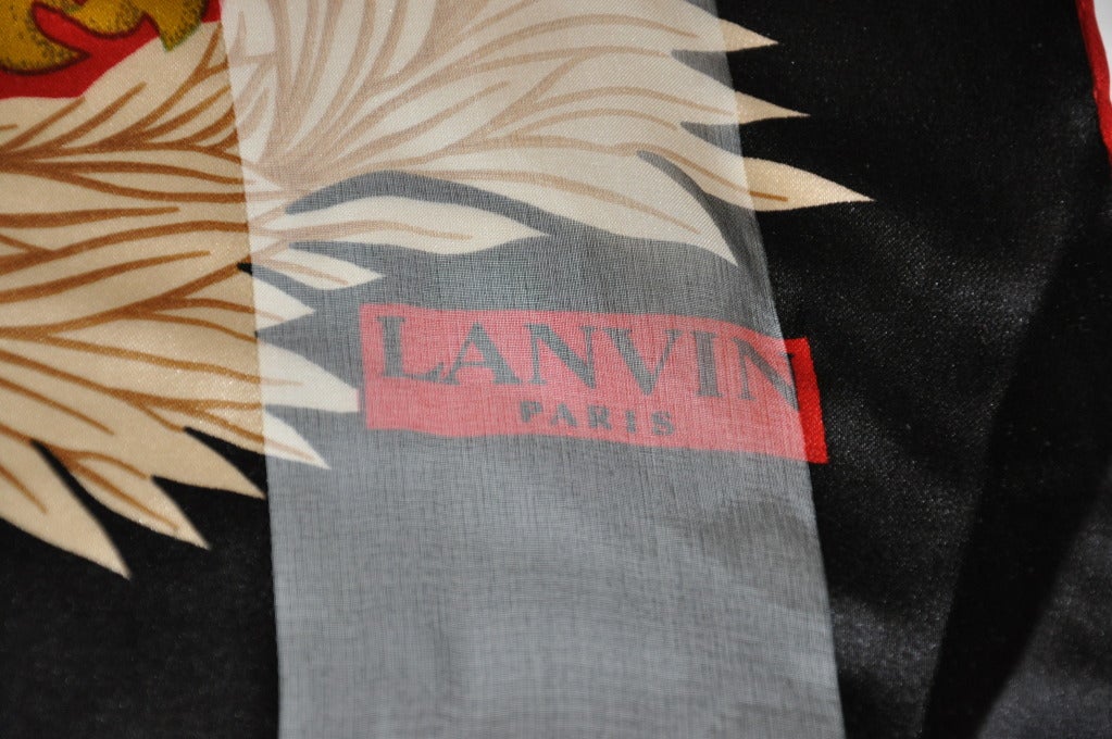 Lanvin's Wonderful combination of silk & silk chiffon multi-colored floral print scarf measures 33