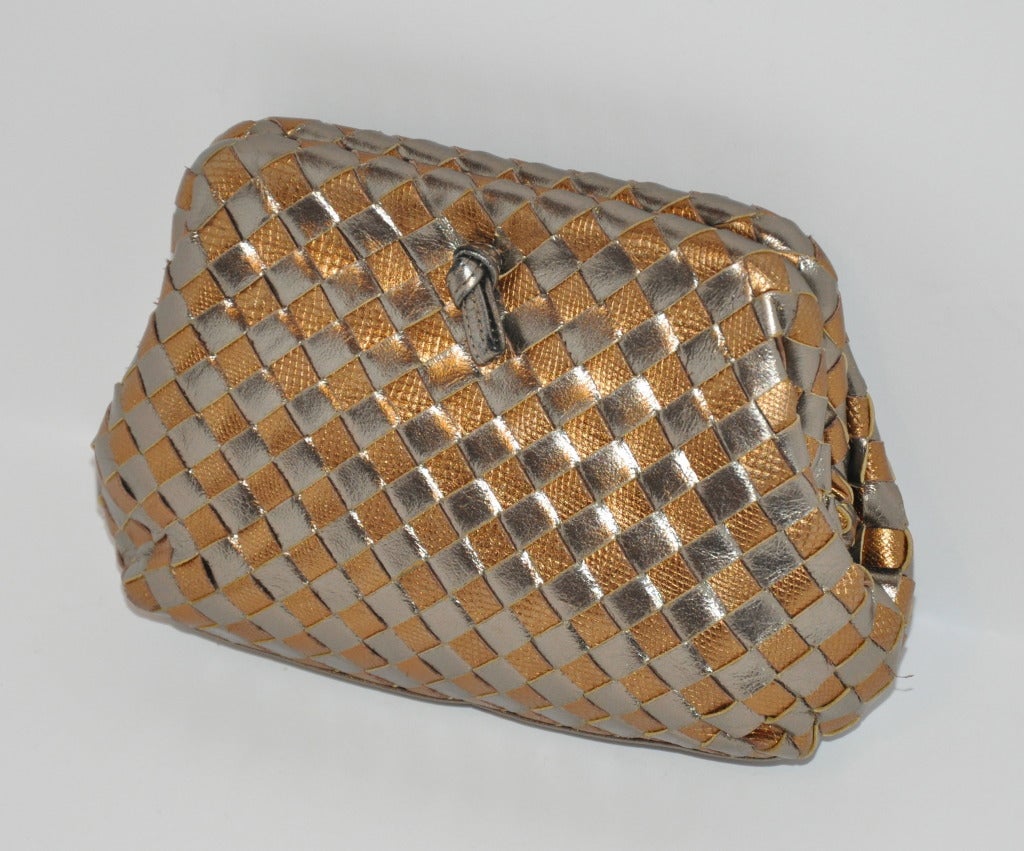 Woven calfskin leather in metallic bronze and embossed gold lizard calfskin evening clutch measures 5 1/2