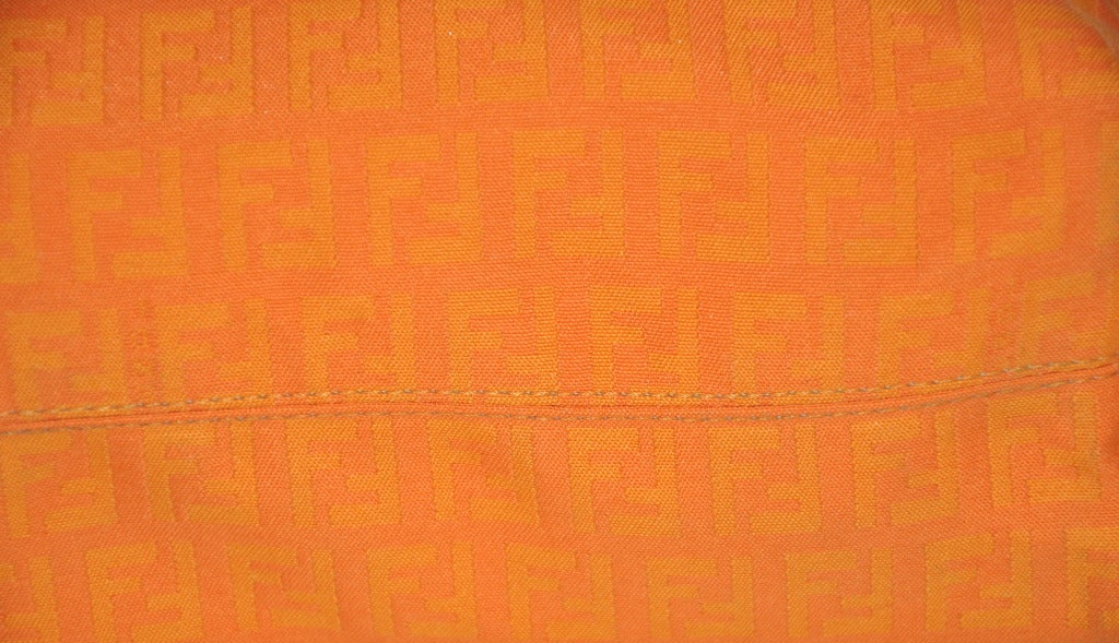 Women's or Men's Fendi's Tangerine Monogramed Clutch For Sale