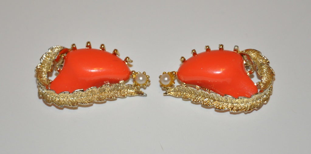 Coro's gilded gold hardware with faux coral and pearl accents clip-on earrings measures 1 1/2