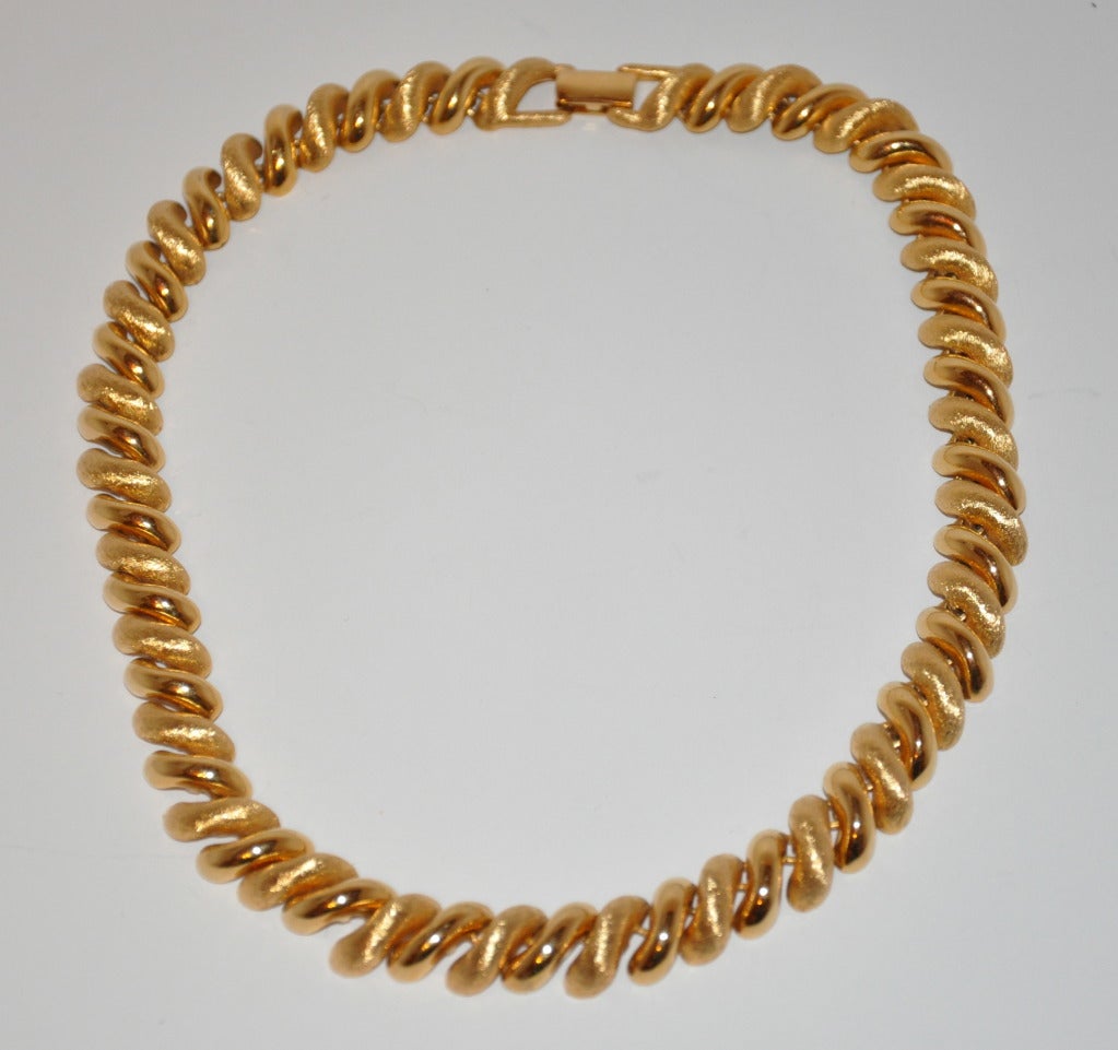 Napier combination of gilded polished and brushed gold makes for a elegant necklace. Necklace measures 16 1/2