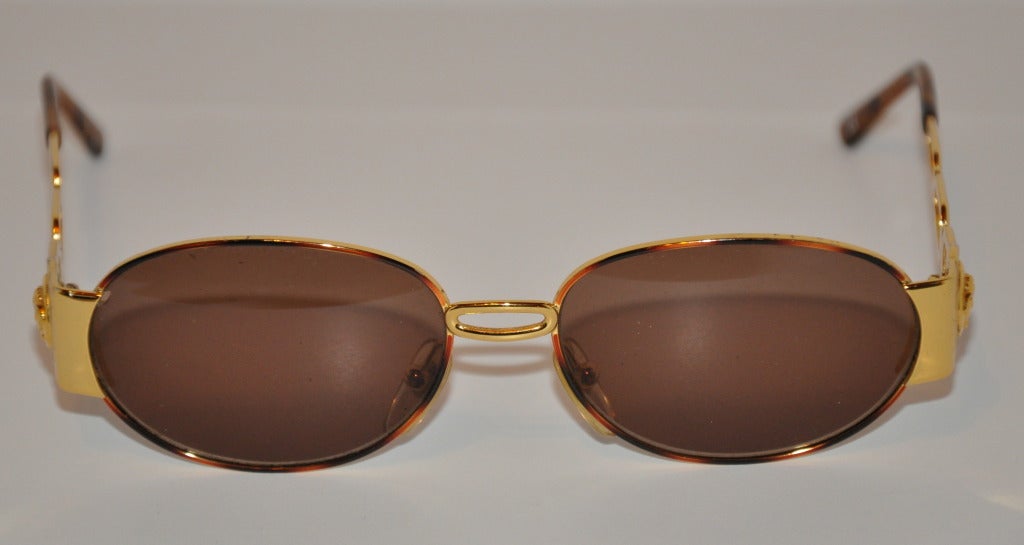 Gianni Versace heavily gilded gold hardware sunglasses measures 1 5/8