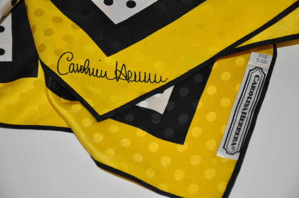 Carolina Herrera huge crepe de chine polka dot scarf has a wonderful border of vibrant yellow and black. The scarf measures 43